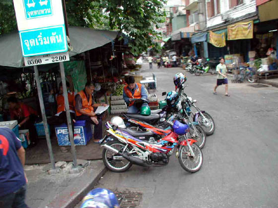 web-030704-motorcycle-taxis.jpg