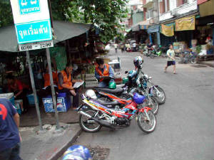 web-030704-motorcycle-taxis.jpg